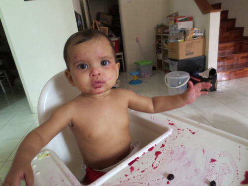 And here is what happens when you play peekaboo with your hands full of blueberry juice!