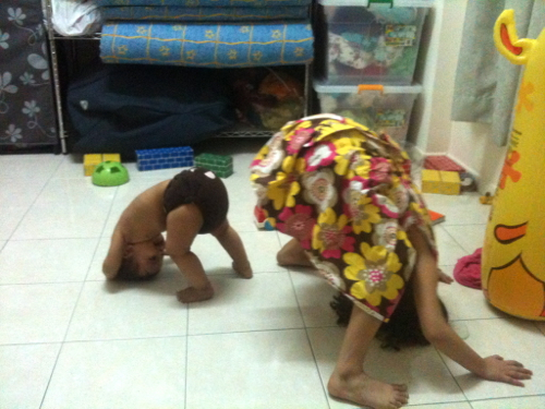 upside down sisters!  Talisa thinks this is hilarious!